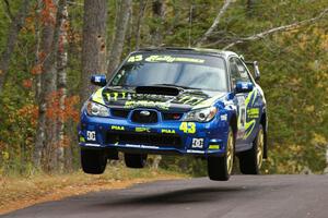 Ken Block / Alex Gelsomino Subaru WRX STi catches nice air at the midpoint jump on SS11, Brockway 1.