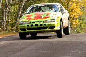 Doug Shepherd / Pete Gladysz keep their Mitsubishi Eclipse glued to the ground at the midpoint jump on Brockway 1, SS11.