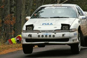 Matt Huuki / Josh VanDenHeuvel catch air at the midpoint jump on Brockway 1, SS11, in their Eagle Talon.