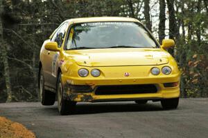 Evan Moen / Dan Victor get the back end of their Acura Integra Type R light over the midpoint jump on Brockway 1, SS11.