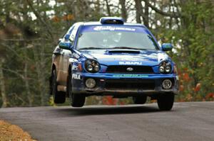 Heath Nunnemacher / Chris Coughlin catch a little air at the midpoint jump on Brockway 1, SS11, in their Subaru WRX.