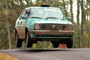 Miles Bothee / Ben Slocum catch decent air on SS11, Brockway 1, in their VW Jetta.