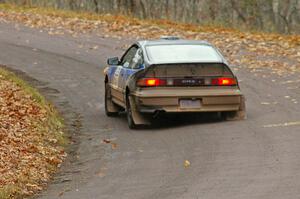 Chris Gordon / Matt Pekuri blast uphill after a hard landing at the midpoint jump on Brockway 1, SS11, in their Honda CRX.