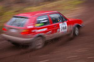 Paul Koll / Matt Wappler drift through the first corner of Gratiot Lake 2, SS15, in their VW GTI.