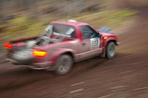 Jim Cox / Scott Parrott get back on the power in their Chevy S-10 at the first corner of Gratiot Lake 2, SS15.