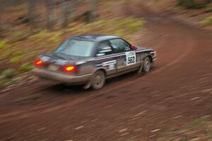 Brian Dondlinger / Dave Parps at speed through the first corner of Gratiot Lake 2, SS15, in their Nissan Sentra SE-R.