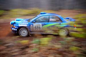 Heath Nunnemacher / Chris Coughlin at speed through the first corner of Gratiot Lake 2, SS15, in their Subaru WRX.