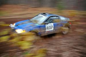 Chris Gordon / Matt Pekuri at speed through the first corner of Gratiot Lake 2, SS15, in their Honda CRX.