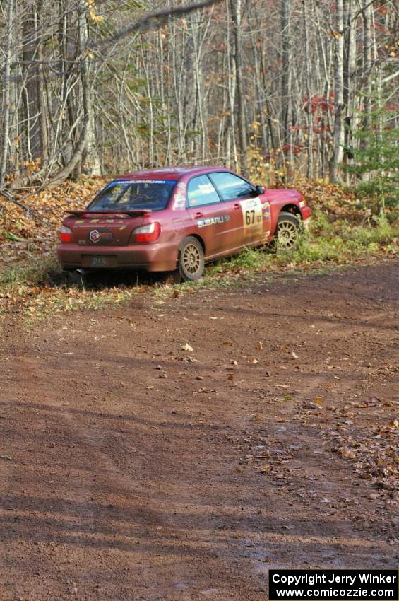 Bryan Pepp / Jerry Stang carried too much speed into the final greasy corner of SS8, Gratiot Lake 1, in their Subaru WRX.