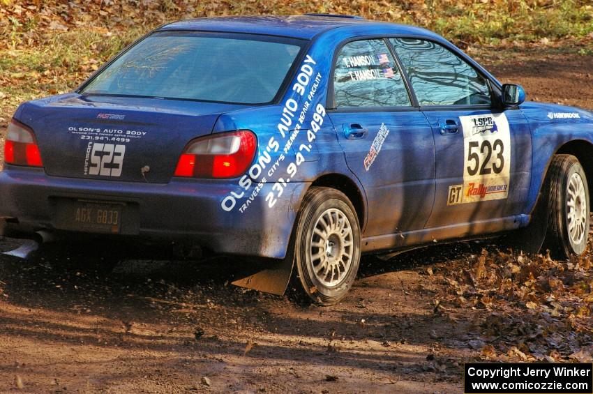 Travis Hanson / Terry Hanson Subaru WRX drifts through the final corner of SS8, Gratiot Lake 1.