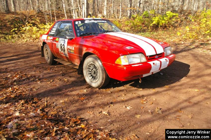 Mark Utecht / Rob Bohn set up for the final hard right-hander before the finish of Gratiot Lake 1, SS8, in their Ford Mustang.