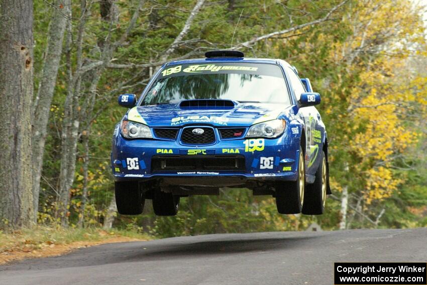 Travis Pastrana / Christian Edstrom catch nice air at the midpoint jump on Brockway 1, SS11, in their Subaru WRX STi.
