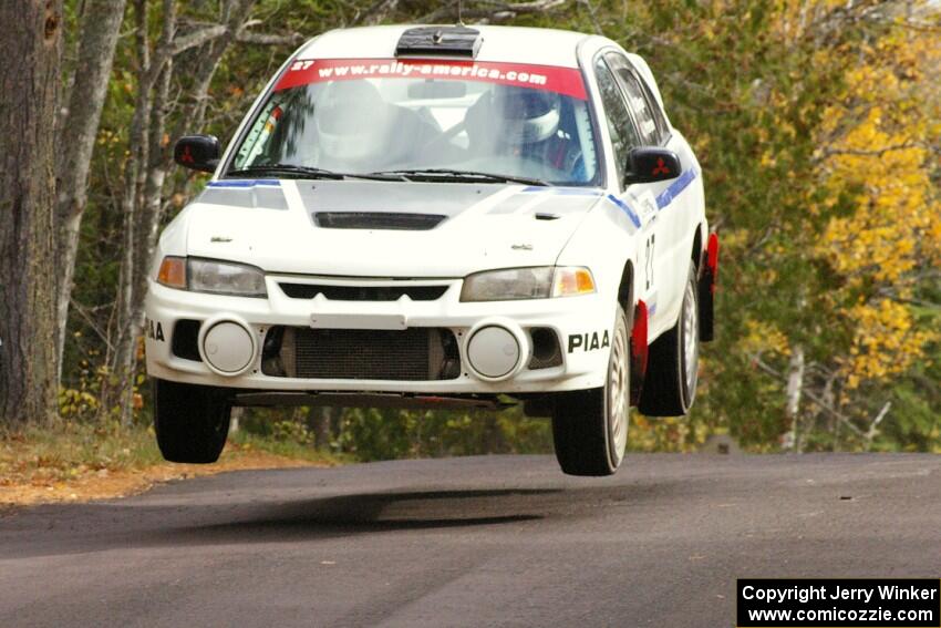 Chris Gilligan / Joe Petersen Mitsubishi Lancer Evo IV at the midpoint jump on Brockway 1, SS11.