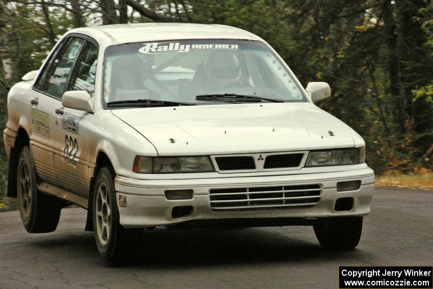 Larry Parker / Mandi Gentry catch a little air at the midpoint jump on Brockway 1, SS11, in their Mitsubishi Galant VR4.