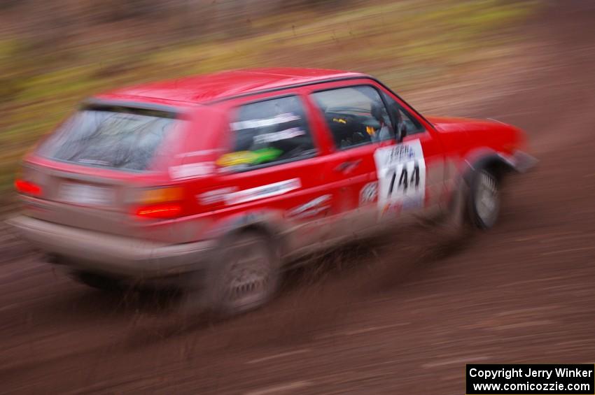 Paul Koll / Matt Wappler drift through the first corner of Gratiot Lake 2, SS15, in their VW GTI.