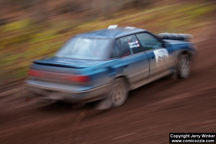 Erick Murray / Nicky Nelson drift through the first corner of SS15, Gratiot Lake 2, in their Subaru Legacy.