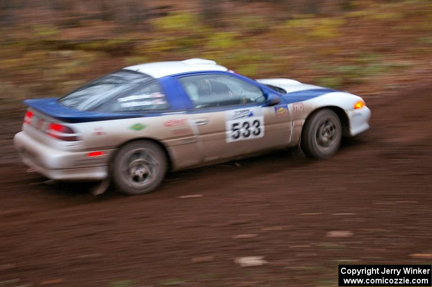 Paul Ritchie / Drew Ritchie drift through the first corner of Gratiot Lake 1, SS15, in their Mitsubishi Eclipse GSX.