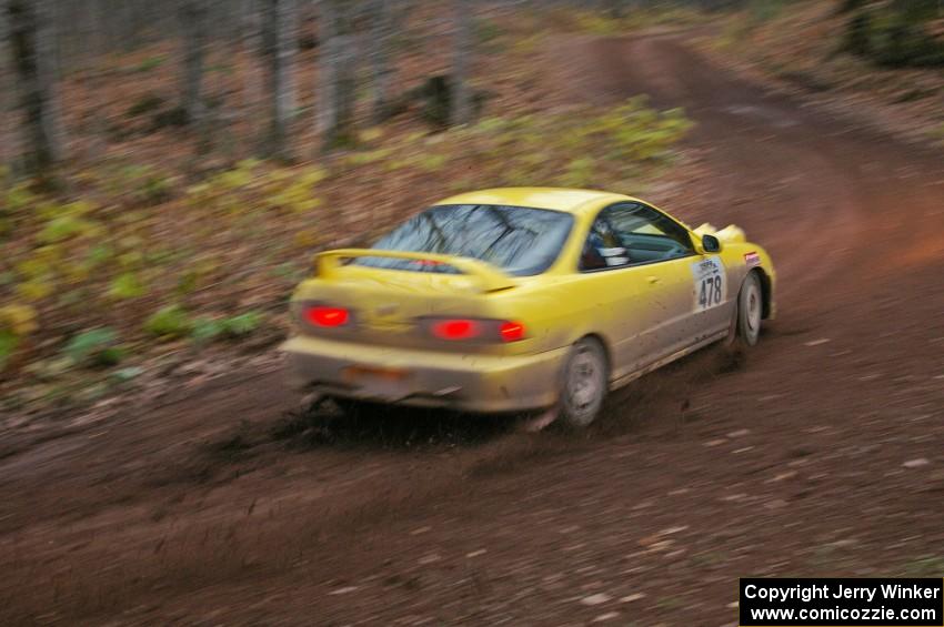 Evan Moen / Dan Victor drift their Acura Integra Type R through the first corner of Gratiot Lake 2, SS15.