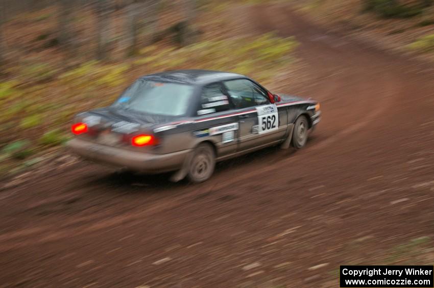Brian Dondlinger / Dave Parps at speed through the first corner of Gratiot Lake 2, SS15, in their Nissan Sentra SE-R.