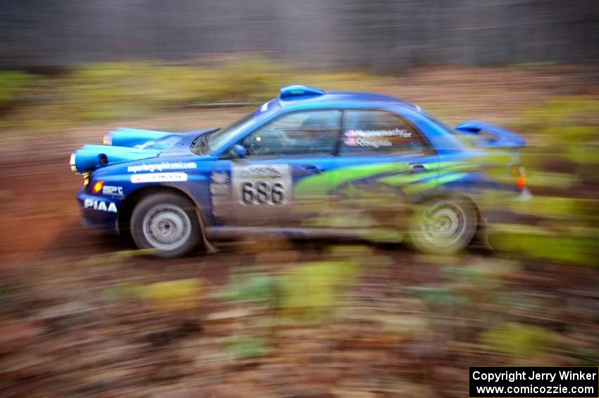Heath Nunnemacher / Chris Coughlin at speed through the first corner of Gratiot Lake 2, SS15, in their Subaru WRX.